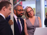 James Cleverly MP and his wife Susannah Cleverly talk to Animal Free Research UK at the Conservative Party Conference at the International C...