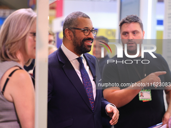 James Cleverly MP and his wife Susannah Cleverly talk to Animal Free Research UK at the Conservative Party Conference at the International C...