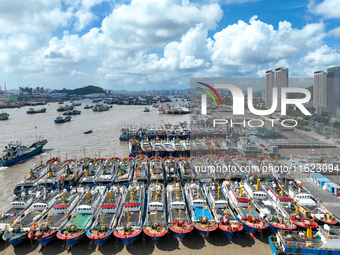 Many fishing boats dock at Shenjiamen Fishing Port in Putuo district of Zhoushan City, Zhejiang province, in Zhoushan, China, on September 3...