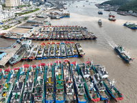 Many fishing boats dock at Shenjiamen Fishing Port in Putuo district of Zhoushan City, Zhejiang province, in Zhoushan, China, on September 3...