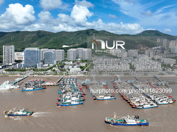 Many fishing boats dock at Shenjiamen Fishing Port in Putuo district of Zhoushan City, Zhejiang province, in Zhoushan, China, on September 3...