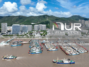 Many fishing boats dock at Shenjiamen Fishing Port in Putuo district of Zhoushan City, Zhejiang province, in Zhoushan, China, on September 3...