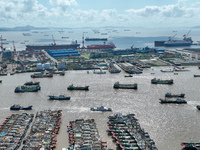 Many fishing boats dock at Shenjiamen Fishing Port in Putuo district of Zhoushan City, Zhejiang province, in Zhoushan, China, on September 3...