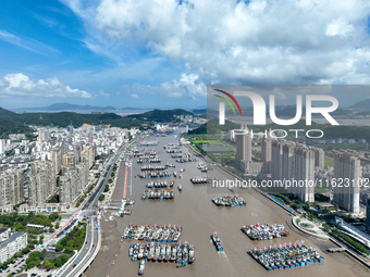 Many fishing boats dock at Shenjiamen Fishing Port in Putuo district of Zhoushan City, Zhejiang province, in Zhoushan, China, on September 3...