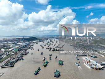 Many fishing boats dock at Shenjiamen Fishing Port in Putuo district of Zhoushan City, Zhejiang province, in Zhoushan, China, on September 3...