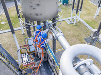 Maintenance personnel carry out a comprehensive overhaul of equipment at the annual maintenance site of the 800 kV Huai'an Converter station...