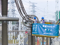 Maintenance personnel carry out a comprehensive overhaul of equipment at the annual maintenance site of the 800 kV Huai'an Converter station...