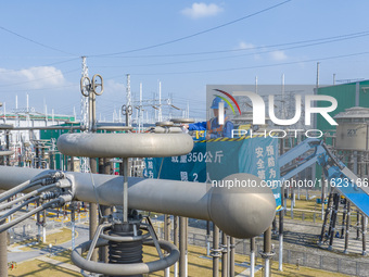 Maintenance personnel carry out a comprehensive overhaul of equipment at the annual maintenance site of the 800 kV Huai'an Converter station...