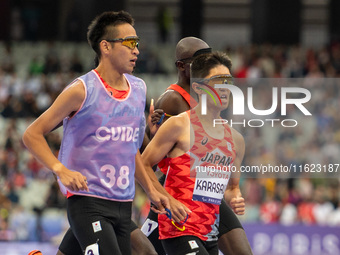 Kenya Karasawa of Team Japan competes in the Men's 5000m T11 Final on day two of the Paris 2024 Summer Paralympic Games at the Stade de Fran...