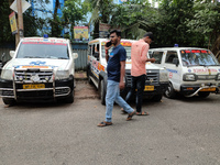 Ambulances park outside a hospital in Kolkata, India, on September 30, 2024. (