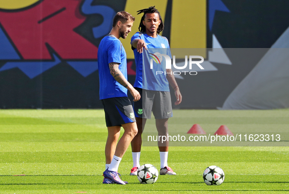 Jules Kounde and Inigo Martinez train at the Joan Gamper sports city before the Champions League match against Young Boys in Barcelona, Spai...