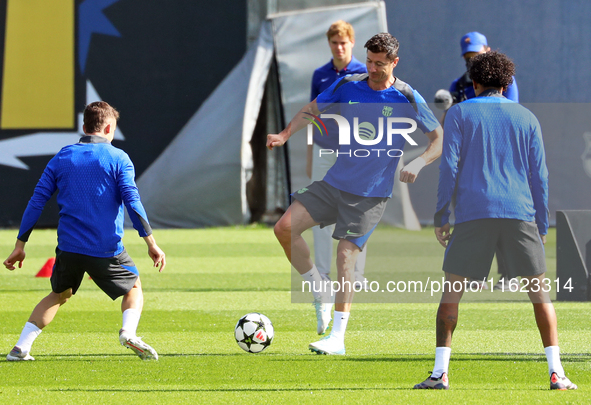 Robert Lewandowski trains with FC Barcelona at the Joan Gamper sports city before the Champions League match against Young Boys in Barcelona...