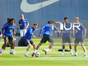 Jules Kounde, Marc Casado, Raphinha Dias, Alejandro Balde, and Frenkie de Jong train at the Joan Gamper sports city, prior to the Champions...