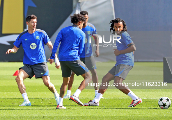 Jules Kounde, Ansu Fati, Raphinha Dias, and Robert Lewandowski train during an FC Barcelona session at the Joan Gamper sports city, prior to...