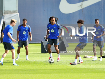 Frenkie de Jong, Alejandro Balde, Jules Kounde, Raphinha Dias, and Ansu Fati train at the Joan Gamper sports city before the Champions Leagu...