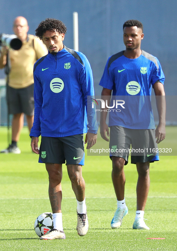 Raphinha Dias and Ansu Fati train with FC Barcelona at the Joan Gamper sports city before the Champions League match against Young Boys in B...