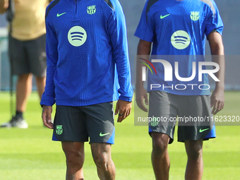 Raphinha Dias and Ansu Fati train with FC Barcelona at the Joan Gamper sports city before the Champions League match against Young Boys in B...