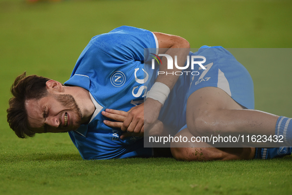 Khvicha Kvaratskhelia of SSC Napoli lies injured during the Serie A match between SSC Napoli and AC Monza at Stadio Diego Armando Maradona N...