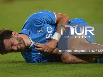 Khvicha Kvaratskhelia of SSC Napoli lies injured during the Serie A match between SSC Napoli and AC Monza at Stadio Diego Armando Maradona N...