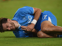 Khvicha Kvaratskhelia of SSC Napoli lies injured during the Serie A match between SSC Napoli and AC Monza at Stadio Diego Armando Maradona N...