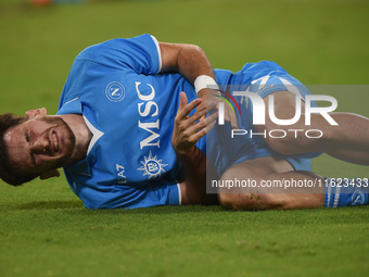 Khvicha Kvaratskhelia of SSC Napoli lies injured during the Serie A match between SSC Napoli and AC Monza at Stadio Diego Armando Maradona N...