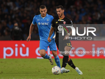 Pedro Pereira of AC Monza competes for the ball with Alessandro Buongiorno of SSC Napoli during the Serie A match between SSC Napoli and AC...