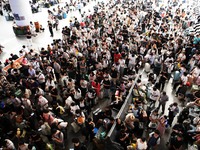 Passengers are seen in a waiting room at Nanchang Railway Station in Nanchang, China, on September 30, 2024. (