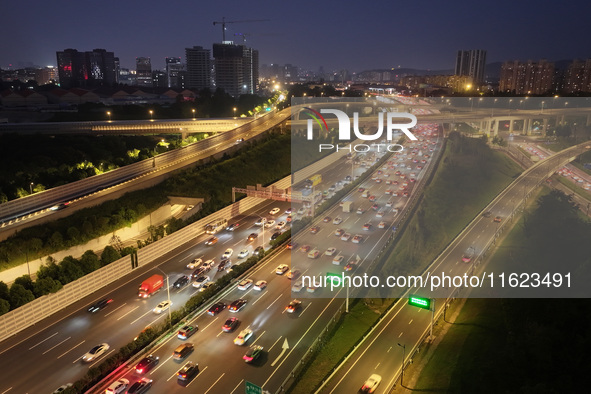 A photo taken on September 30, 2024, shows congestion on several expressways during the National Day holiday in Nanjing, China. 