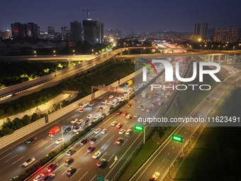 A photo taken on September 30, 2024, shows congestion on several expressways during the National Day holiday in Nanjing, China. (