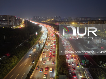 A photo taken on September 30, 2024, shows congestion on several expressways during the National Day holiday in Nanjing, China. (