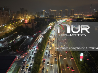 A photo taken on September 30, 2024, shows congestion on several expressways during the National Day holiday in Nanjing, China. (