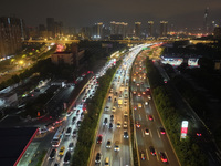 A photo taken on September 30, 2024, shows congestion on several expressways during the National Day holiday in Nanjing, China. (