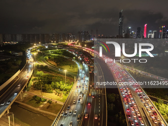 A photo taken on September 30, 2024, shows congestion on several expressways during the National Day holiday in Nanjing, China. (