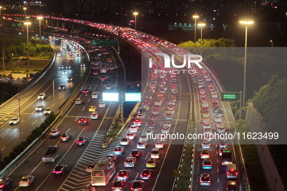 A photo taken on September 30, 2024, shows congestion on several expressways during the National Day holiday in Nanjing, China. 