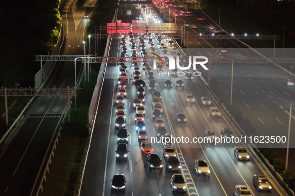 A photo taken on September 30, 2024, shows congestion on several expressways during the National Day holiday in Nanjing, China. 