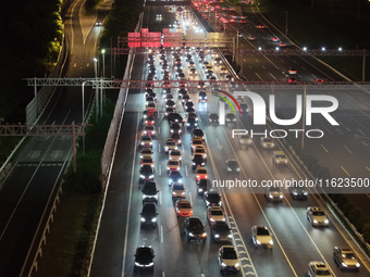 A photo taken on September 30, 2024, shows congestion on several expressways during the National Day holiday in Nanjing, China. (