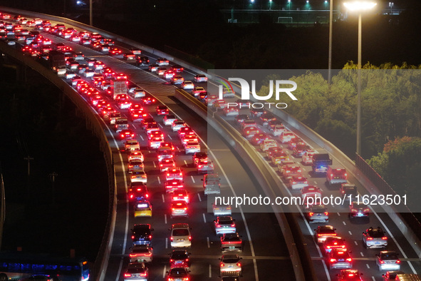 A photo taken on September 30, 2024, shows congestion on several expressways during the National Day holiday in Nanjing, China. 