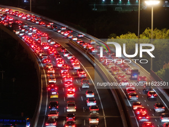 A photo taken on September 30, 2024, shows congestion on several expressways during the National Day holiday in Nanjing, China. (