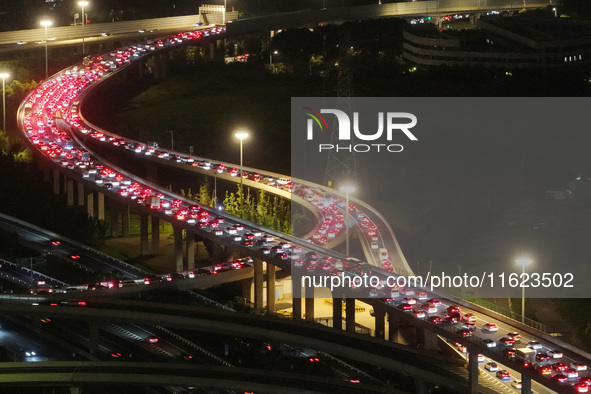 A photo taken on September 30, 2024, shows congestion on several expressways during the National Day holiday in Nanjing, China. 