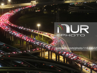 A photo taken on September 30, 2024, shows congestion on several expressways during the National Day holiday in Nanjing, China. (