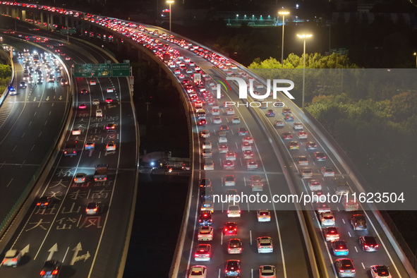 A photo taken on September 30, 2024, shows congestion on several expressways during the National Day holiday in Nanjing, China. 