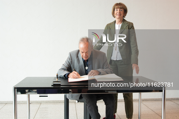 Actor Udo Kier greets Cologne Mayor Henriette Reker for his 80th birthday and signs the Golden Book at Cologne Town Hall in Cologne, Germany...