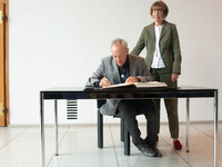 Actor Udo Kier greets Cologne Mayor Henriette Reker for his 80th birthday and signs the Golden Book at Cologne Town Hall in Cologne, Germany...