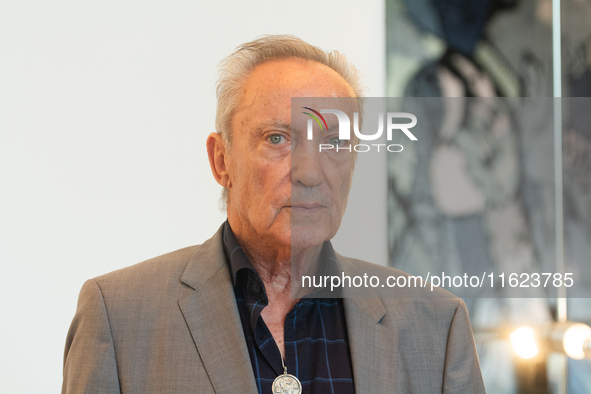 Actor Udo Kier greets Cologne Mayor Henriette Reker for his 80th birthday and signs the Golden Book at Cologne Town Hall in Cologne, Germany...