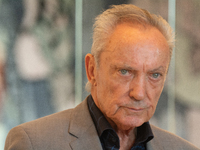 Actor Udo Kier greets Cologne Mayor Henriette Reker for his 80th birthday and signs the Golden Book at Cologne Town Hall in Cologne, Germany...