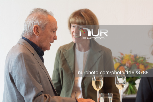 Actor Udo Kier greets Cologne Mayor Henriette Reker for his 80th birthday and signs the Golden Book at Cologne Town Hall in Cologne, Germany...