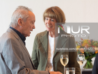 Actor Udo Kier greets Cologne Mayor Henriette Reker for his 80th birthday and signs the Golden Book at Cologne Town Hall in Cologne, Germany...