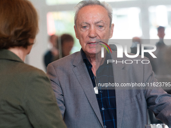 Actor Udo Kier greets Cologne Mayor Henriette Reker for his 80th birthday and signs the Golden Book at Cologne Town Hall in Cologne, Germany...