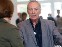 Actor Udo Kier greets Cologne Mayor Henriette Reker for his 80th birthday and signs the Golden Book at Cologne Town Hall in Cologne, Germany...