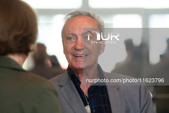 Actor Udo Kier greets Cologne Mayor Henriette Reker for his 80th birthday and signs the Golden Book at Cologne Town Hall in Cologne, Germany...